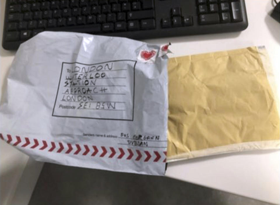 In this handout photo provided by Sky News, a suspect package that was sent to Waterloo station is seen in England, Tuesday, March 5, 2019. Britain’s counter-terrorism police are investigating after three suspicious packages were found in London, including one near City Airport and one near Heathrow Airport. Police said Tuesday all three write postal bags contained yellow bags thought by specialist police to be small improvised explosive devices. Police say the devices “appear capable of igniting an initially small fire when opened.” (Sky News via AP)