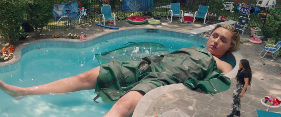 A large-sized Emma Meyer (Lizze Broadway) in a pool on season one, episode five of "Gen V."