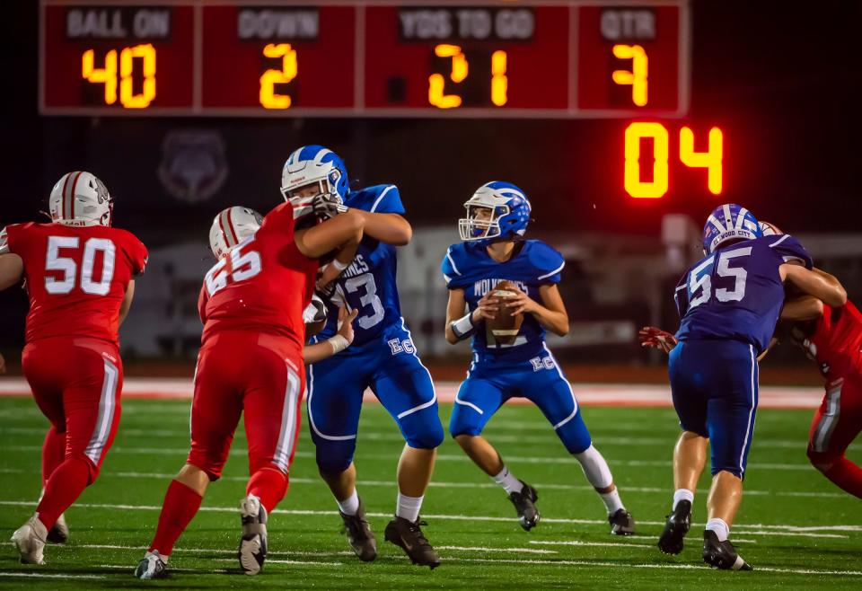 Ellwood City QB Chris Smiley looks to pass against Freedom late in the 3rd quarter of their game Friday at Jimbo Covert Field. [Lucy Schaly/For BCT]