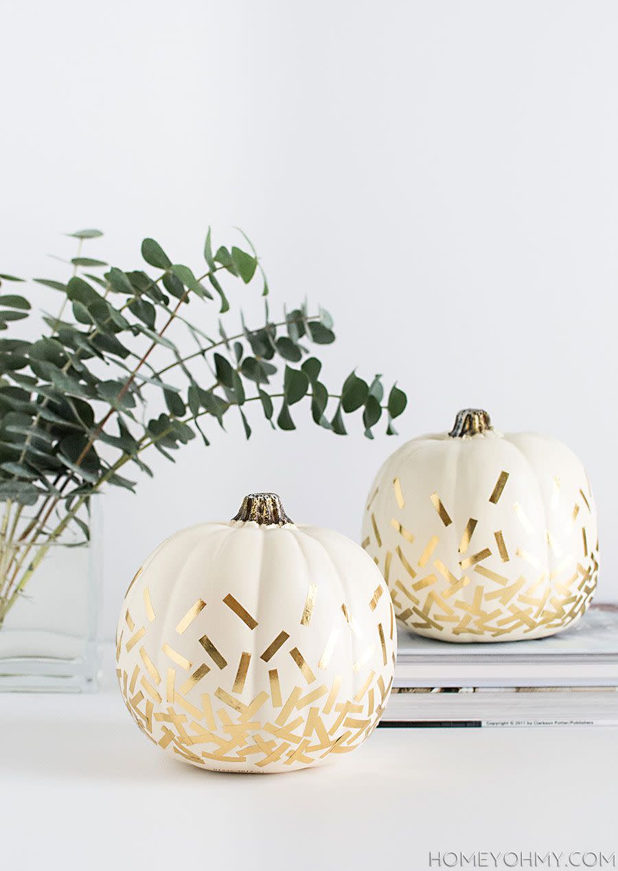 <p>Celebrate the beginning of fall by throwing confetti onto your pumpkins.</p><p><strong>Get the tutorial at <a href="http://www.homeyohmy.com/diy-confetti-pumpkins/" rel="nofollow noopener" target="_blank" data-ylk="slk:Homey Oh My;elm:context_link;itc:0;sec:content-canvas" class="link ">Homey Oh My</a>.</strong></p>