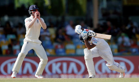 Cricket - England v Sri Lanka, Third Test - Colombo, Sri Lanka - November 24, 2018. England's Keaton Jennings takes the catch to dismiss Sri Lanka's Dimuth Karunaratne. REUTERS/Dinuka Liyanawatte