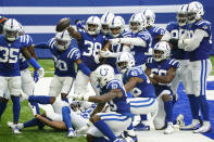 Indianapolis Colts cornerback T.J. Carrie (38) celebrates a touchdown on an interception against the New York Jets in the second half of an NFL football game in Indianapolis, Sunday, Sept. 27, 2020. (AP Photo/AJ Mast)