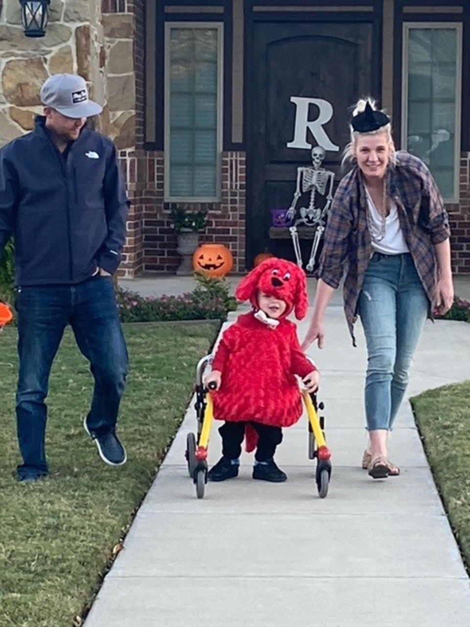 Brady and his parents on Halloween. (Courtesy Nicole Clark)