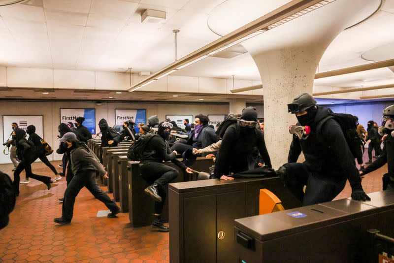 People protest following the fatal police shooting of 20-year-old Black man Daunte Wright in Minnesota , in Washington