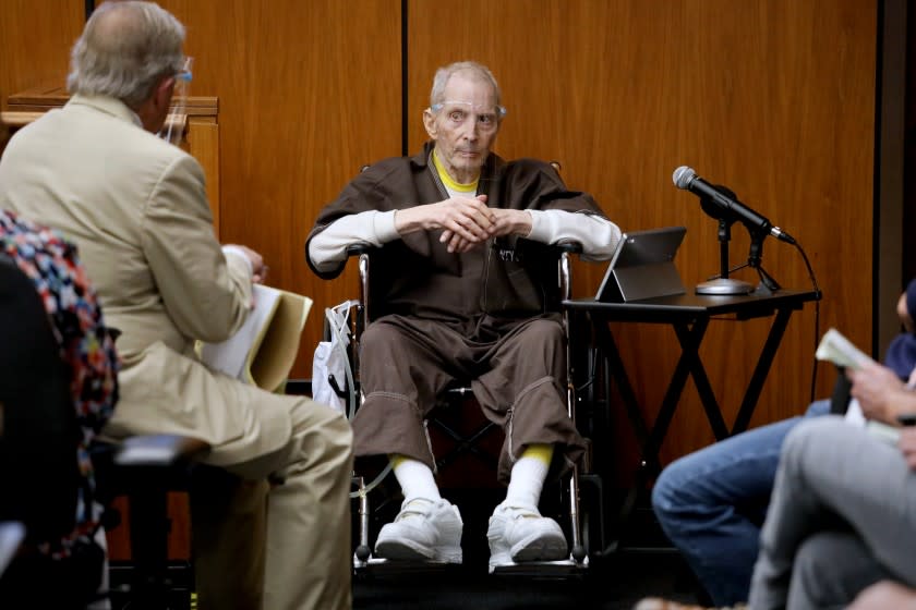 INGLEWOOD, CA - AUGUST 09: Robert Durst, 78, New York real estate scion, takes the stand and testifies in his murder trial answering questions from defense attorney Dick DeGuerin, left, at the Inglewood Courthouse on Monday, Aug. 9, 2021 in Inglewood, CA. Durst is charged with the 2000 murder of Susan Berman inside her Benedict Canyon home. He testified Monday that he did not kill his best friend Berman. (Gary Coronado / Los Angeles Times)