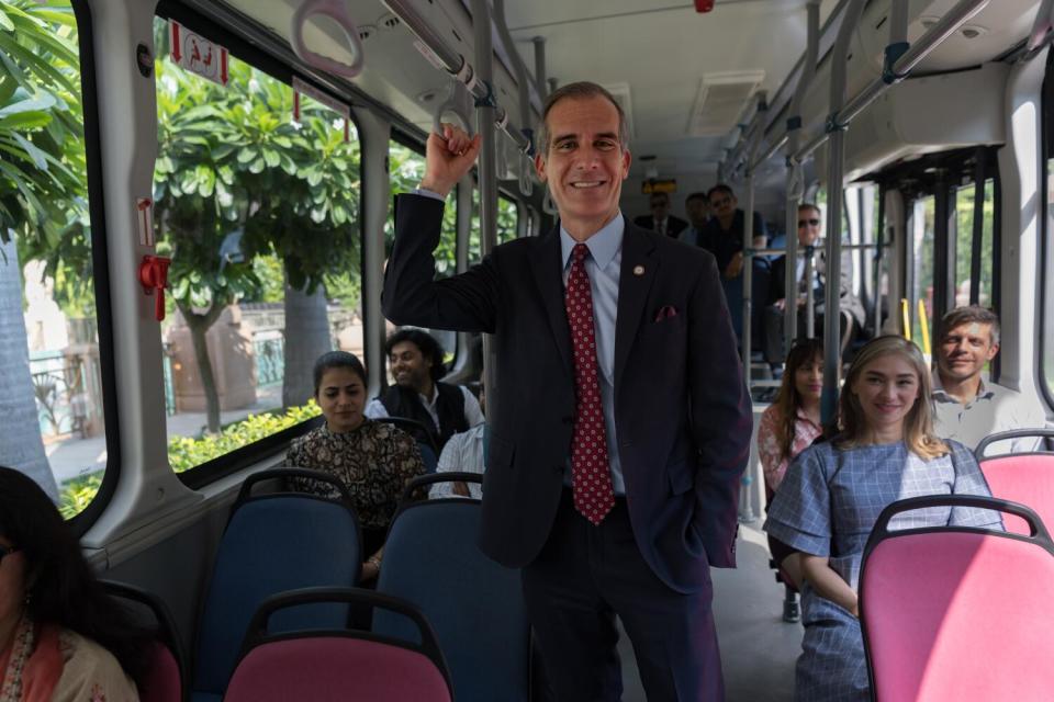 Garcetti takes a ride in an electric bus in Delhi.