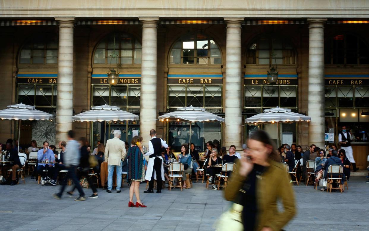 Parisians are now able to return to the dining rooms of restaurants - AP