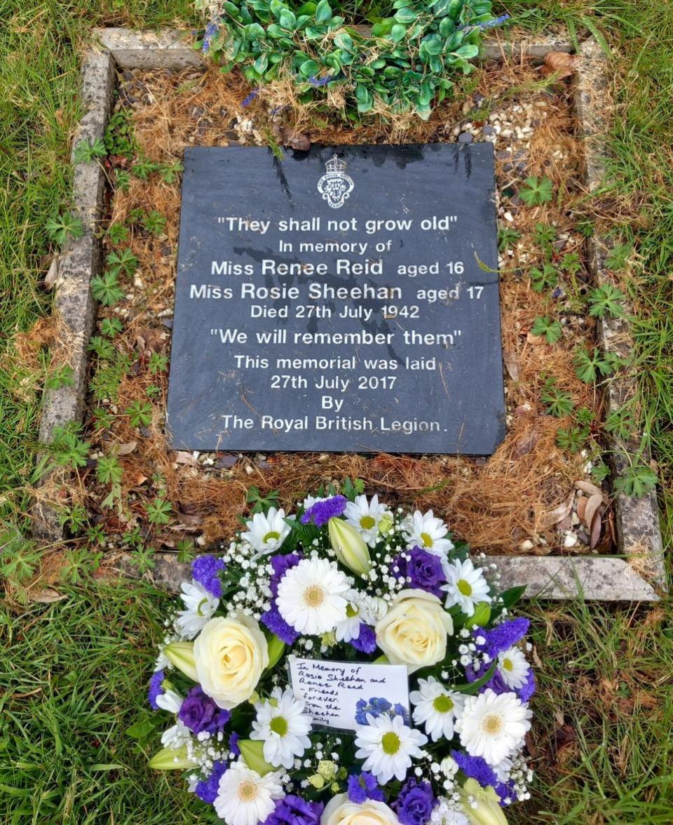 Wiltshire Times: The wreath and plaque on the formerly unmarked grave of cousins Rosie Sheehan and Renee Reid who died in 1942 when a German bomb hit the Trowbridge Royal British Legion Club in Stallard Street.
