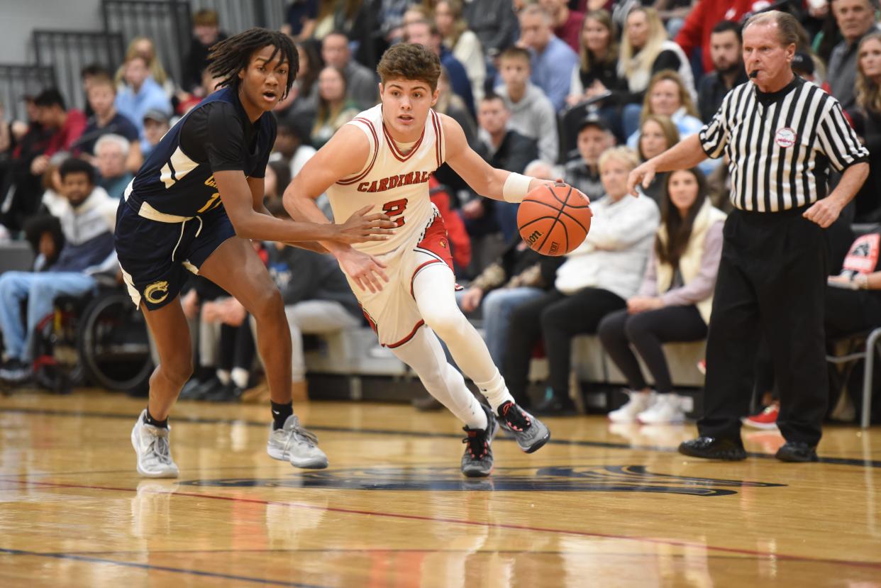 Cardinal Mooney's Brian Everhart pushes the ball during a game earlier this season.