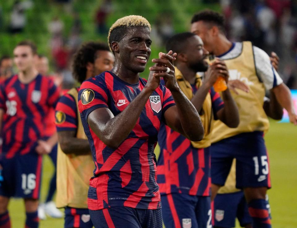 Gyasi Zardes acknowledges fans after the USMNT's victory over Qatar in a Concacaf Gold Cup semifinal at Q2 Stadium.