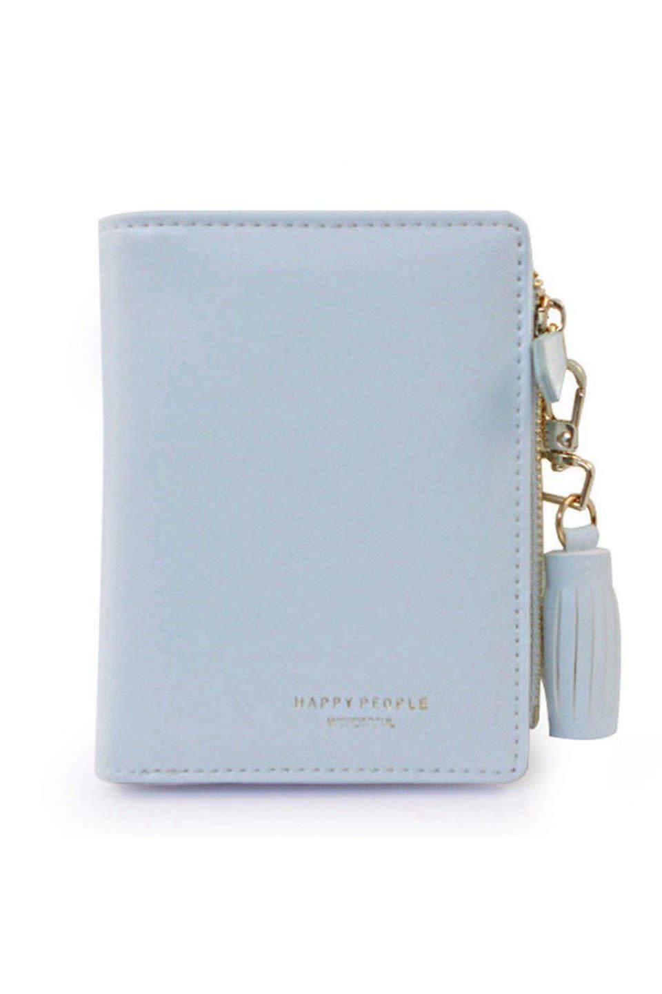 <p>$11</p><p><a class="link " href="https://www.amazon.com/Wallet-Leather-Ladies-Tassel-Holder/dp/B07BJ49F1X/" rel="nofollow noopener" target="_blank" data-ylk="slk:SHOP NOW;elm:context_link;itc:0;sec:content-canvas">SHOP NOW</a></p><p>The tassel detail and small size of this wallet means she'll be able to take it with her wherever she goes.</p>