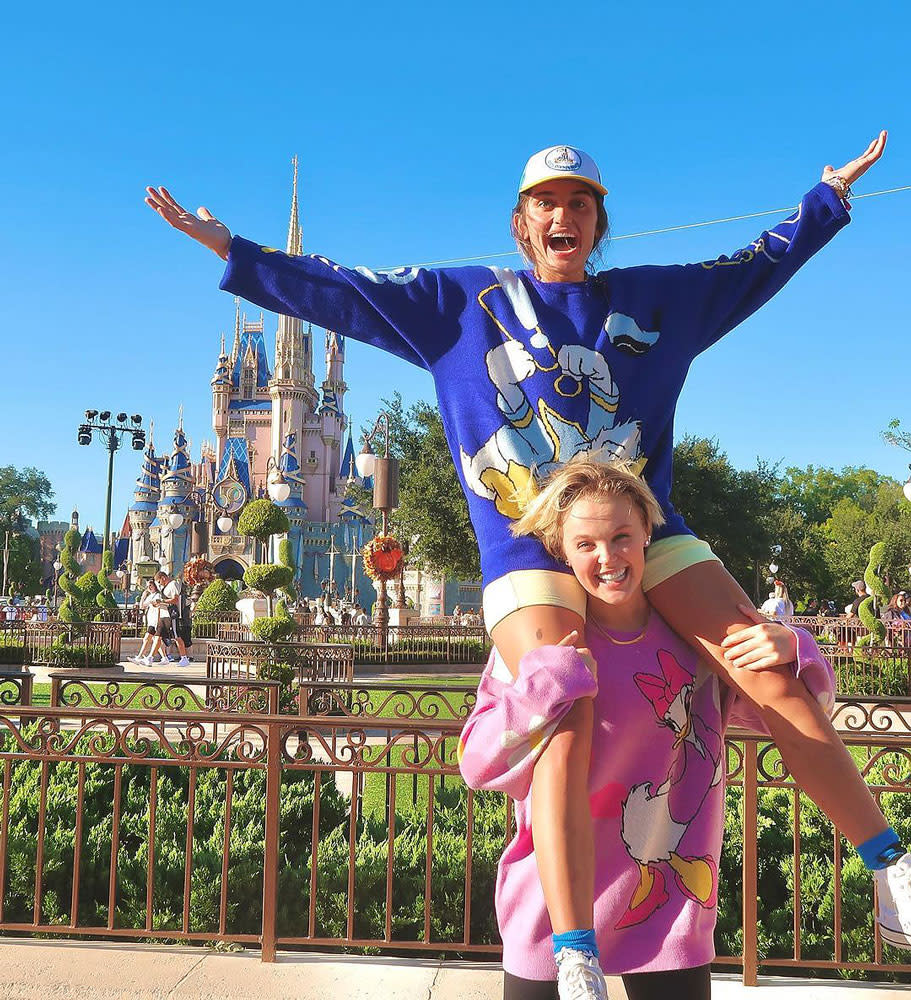 <p>JoJo Siwa is enjoying some quality time with new girlfriend Avery Cyrus! The <em>Dance Moms</em> alum shared a slideshow of photos from their trip together on <a href="https://www.instagram.com/p/CjODm_br-sS/" rel="nofollow noopener" target="_blank" data-ylk="slk:Instagram;elm:context_link;itc:0;sec:content-canvas" class="link ">Instagram</a>, including of shot of Cyrus on her shoulders in front of Cinderella's castle. The two wore coordinated Donald and Daisy Duck sweaters in the sweet shot. "Week 1011!🎡 ," she captioned the post.</p>