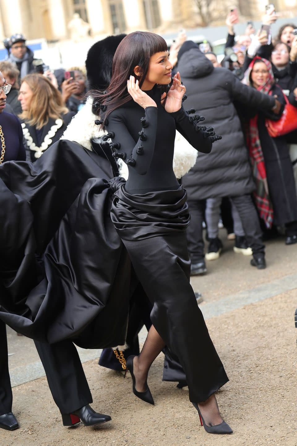 a woman in a black dress