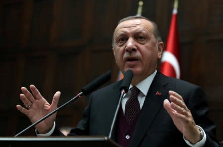 FILE PHOTO: Turkish President Tayyip Erdogan addresses members of parliament in Ankara, Turkey, January 9, 2018. REUTERS/Umit Bektas /File Photo