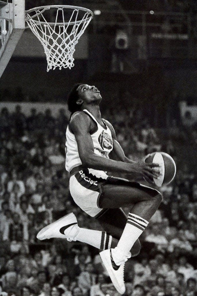 David Thompson of the Denver Nuggets is shown during the 1976 ABA All-Star dunk contest in Denver.