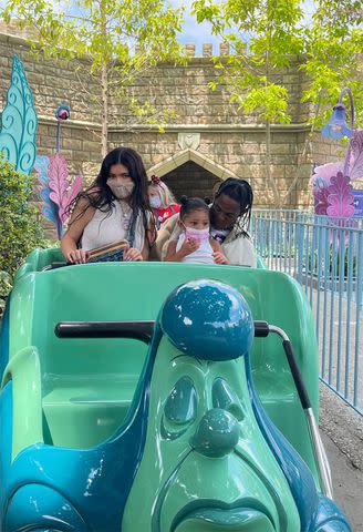 Kylie Jenner/Instagram Kylie Jenner, Stormi Webster and Travis Scott on a ride at Disney.