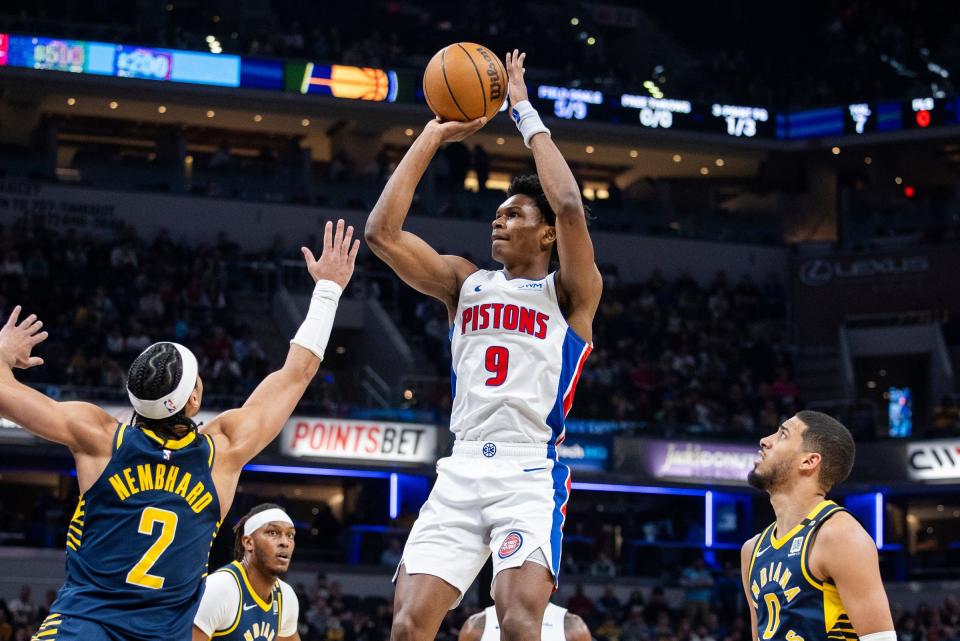 Pistons forward Ausar Thompson shoots the ball while Pacers guard Andrew Nembhard defends in the first half on Thursday, Feb. 22, 2024, in Indianapolis.