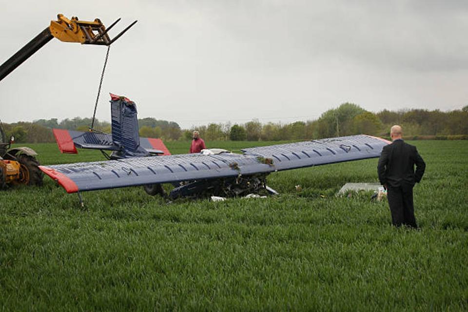 A light aircraft lies in a field at Hinton Airfield after crashing on May 6, 2010, in Brackley, England. The plane was carrying Ukip candidate Nigel Farage (Peter Macdiarmid / Getty Images)