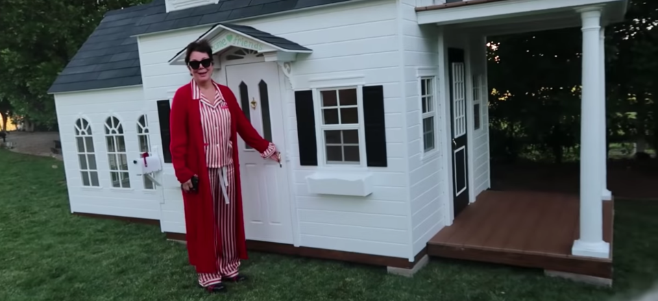 Kris Jenner stands in front of the house she bought Stormi Webster for Christmas.
