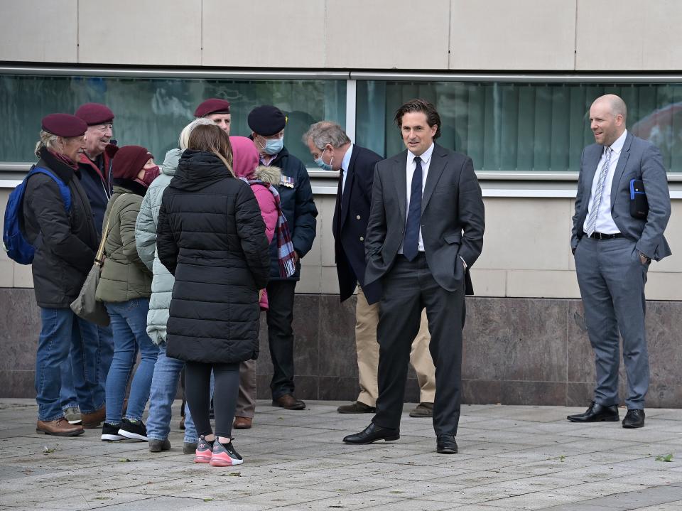 Former veterans minister Johnny Mercer (second from right) said it was time for the government to deliver on its promise to protect former soldiersCharles McQuillan/Getty Images