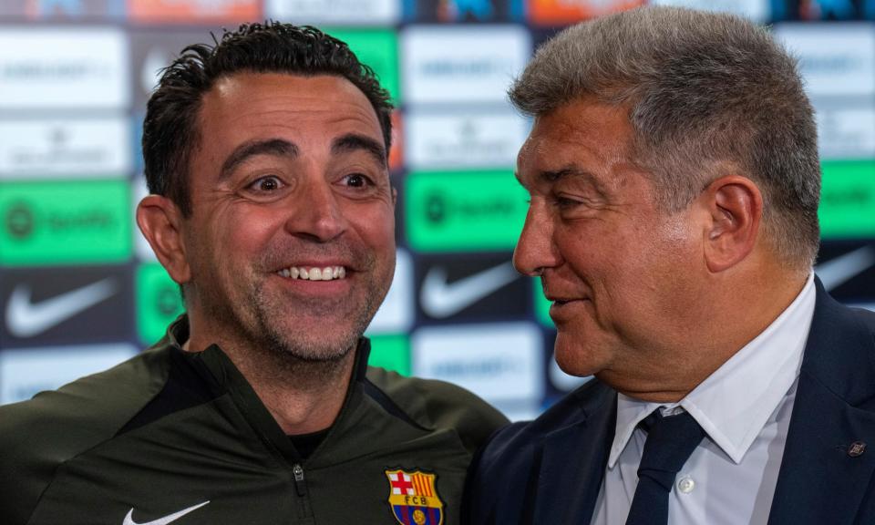 <span>Xavi Hernández (left) and Joan Laporta in April when the president celebrated the manager’s decision to continue in his role next season.</span><span>Photograph: Emilio Morenatti/AP</span>