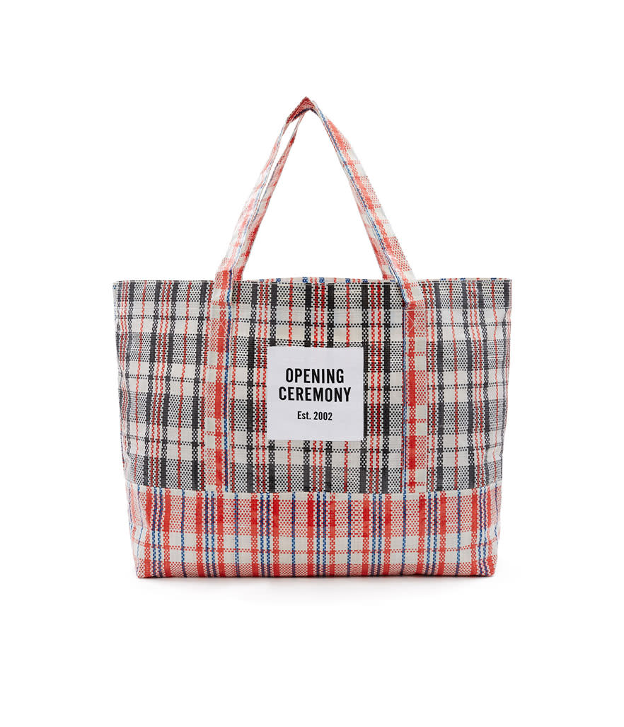 <p>Large Plaid Tote Bag, $35,<a rel="nofollow noopener" href="https://www.openingceremony.com/mens/opening-ceremony/large-plaid-tote-bag-ST89707.html?gender=w" target="_blank" data-ylk="slk:openingceremony.com;elm:context_link;itc:0;sec:content-canvas" class="link "> openingceremony.com</a> </p>