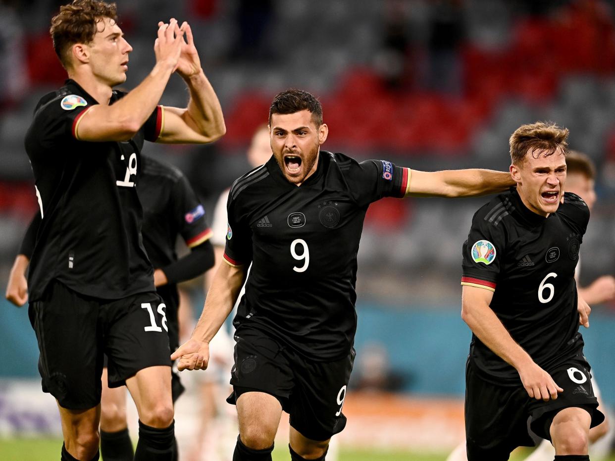 Leon Goretzka (left) celebrates after scoring for Germany (AP)