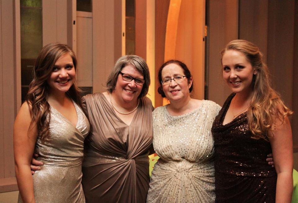 This January 19, 2013 photo shows Shelly Crocker, second left and Sandy Kibort, second right, during their wedding with their daughters, Emma Kibort-Crocker, left, and Hannah Kibort-Crocker, right, at Congregation Beth Shalom in Seattle, Wash. Washington State voters approved same sex marriage with the passing of Referendum 74 in November, 2012. (AP Photo/Shelly Crocker, Sarah Vanausdoll)