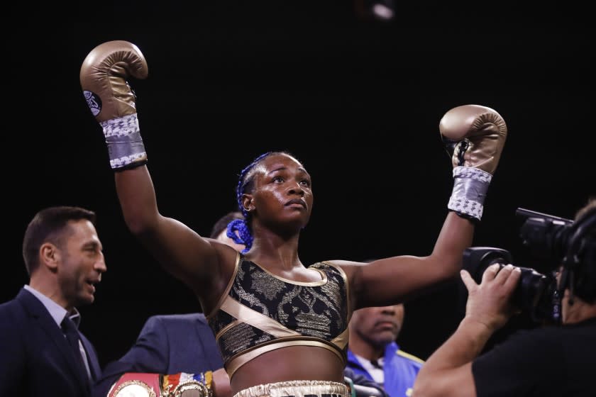 Claressa Shields stands for her introduction for her 154-pound title fight with Ivana Habazin on Jan. 10, 2020.