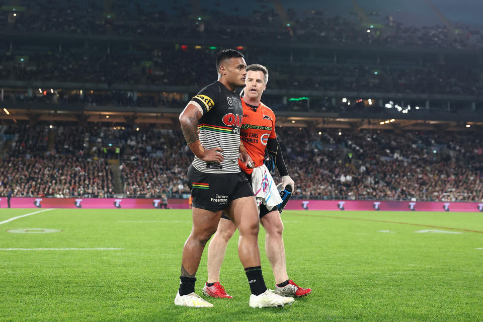 Pete Green, pictured here escorting Spencer Leniu from the field during Penrith's win over South Sydney.