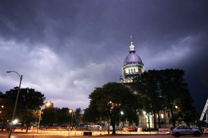 The Illinois State Capitol is pictured during a storm in Springfield in an undated file photo.