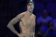 Tony Ervin gets ready to compete in a men's 50-meter freestyle preliminary heat during wave 2 of the U.S. Olympic Swim Trials on Saturday, June 19, 2021, in Omaha, Neb. (AP Photo/Charlie Neibergall)