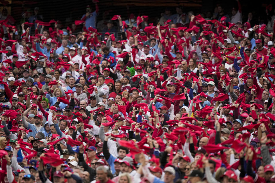Fans cheer during the first inning in Game 5 of the baseball NL Championship Series between the San Diego Padres and the Philadelphia Phillies on Sunday, Oct. 23, 2022, in Philadelphia. (AP Photo/Brynn Anderson)