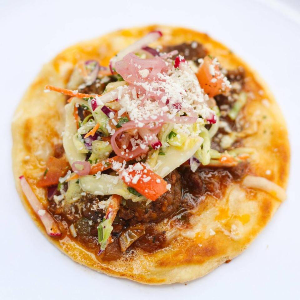 Seared beef taco using some ingredients cooked in a wok for better flavor. John MacKinnon has opened Todo Bueno, the All Good Grill upstairs at the San Luis Obispo Public Market.