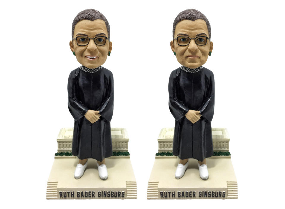 This product image shows two versions of the Ruth Bader Ginsburg bobblehead figurine. They're available for $25 each or $45 for the pair. (National Bobblehead Hall of Fame & Museum via AP)