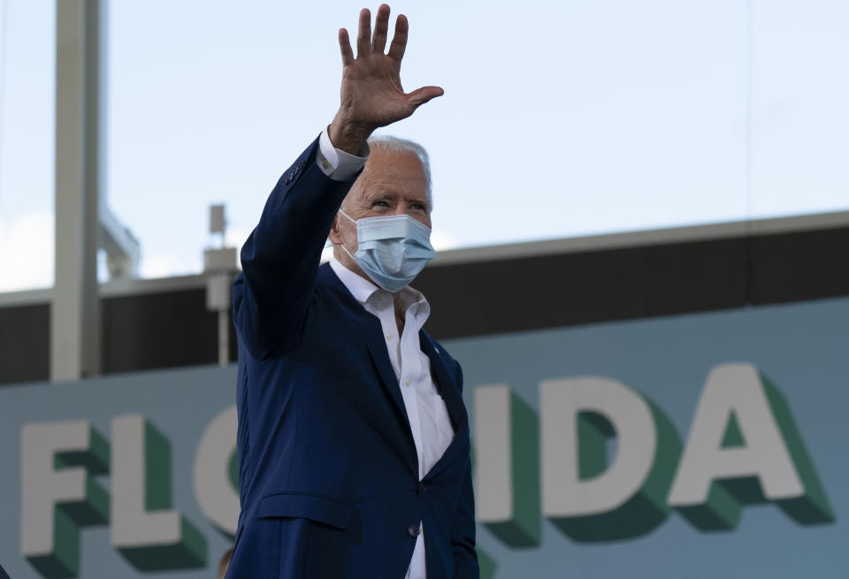 Democratic presidential candidate former Vice President Joe Biden waves to the crowd at Miramar Regional Park in Miramar, Fla., Tuesday Oct. 13, 2020. (AP Photo/Carolyn Kaster)