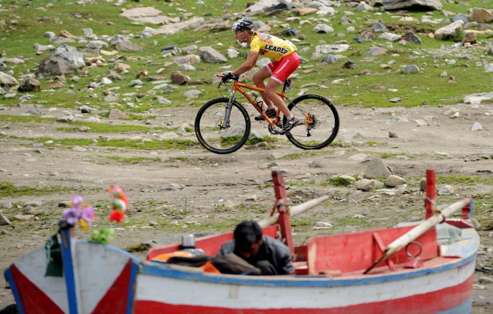 Slovakia's cyclist Martin Haring rides during the second stage of the Himalayas 2011 International Mountainbike Race in the mountainous area of Lake Saif-ul-Maluk in Pakistan's tourist region of Naran in Khyber Pakhtunkhwa province on September 17, 2011. The cycling event, organised by the Kaghan Memorial Trust to raise funds for its charity school set up in the Kaghan valley for children affected in the October 2005 earthquake, attracted some 30 International and 11 Pakistani cyclists. AFP PHOTO / AAMIR QURESHI (Photo credit should read AAMIR QURESHI/AFP/Getty Images)