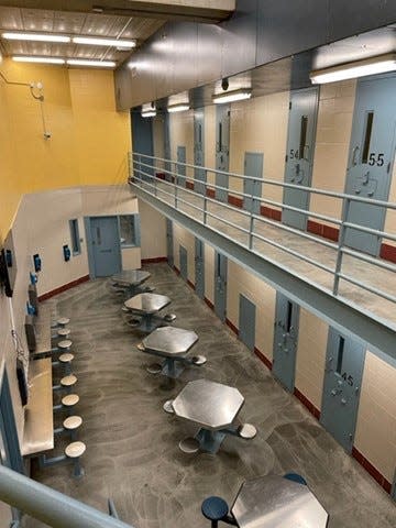 A cell block at the Monroe County Correctional Center after being cleaned and repainted by jail staff and inmates. Because this cell block houses those with mental health struggles, jail staff consulted with a social worker on the most soothing color palette.