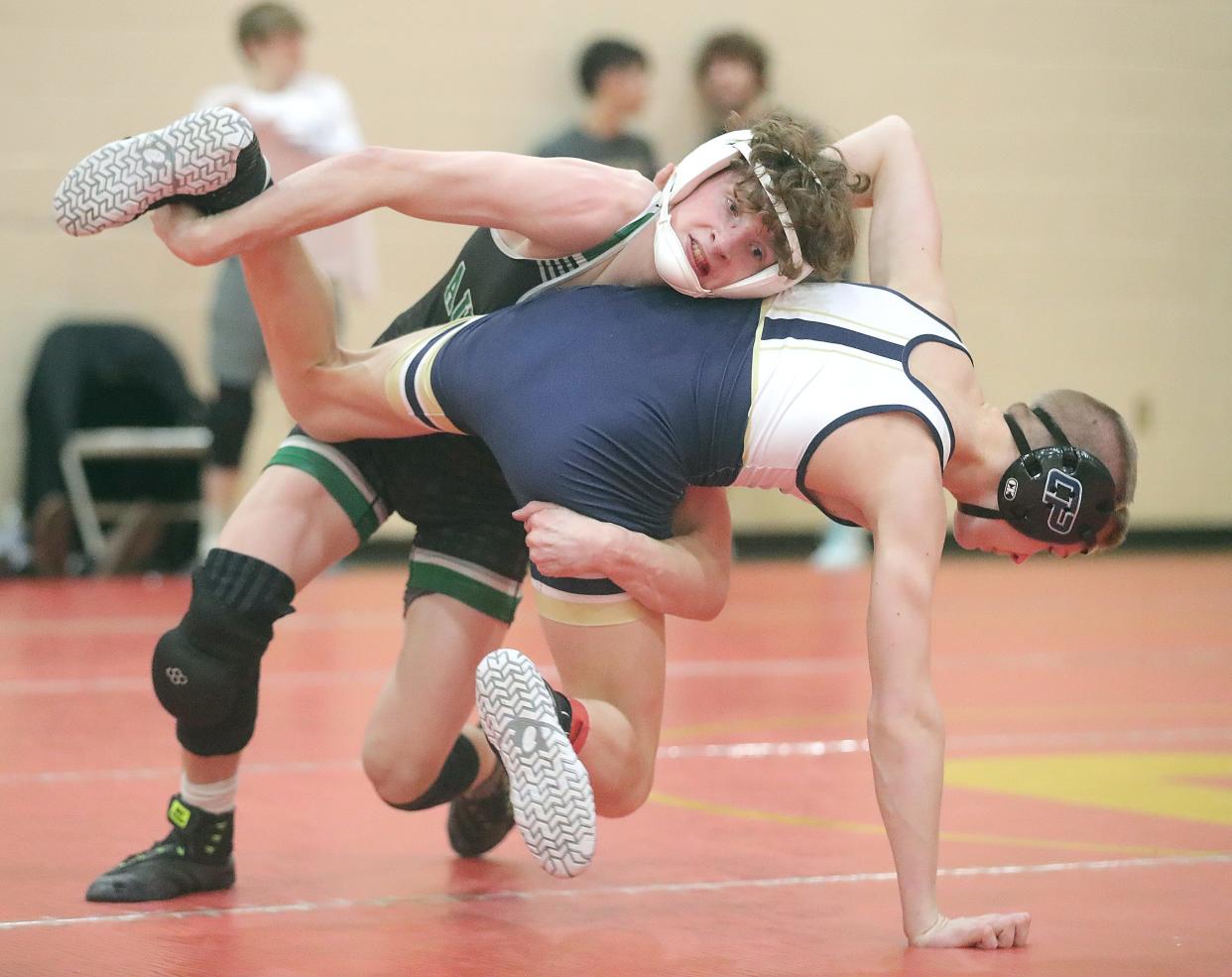Aurora's Johnny Green keeps impressing as he works his way toward a state title.