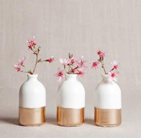 This Georgia-based Amazon Handmade shop specializes in handcrafted porcelain home decor. Find these <a href="https://amzn.to/31unVPG" target="_blank" rel="noopener noreferrer">white and gold porcelain bud vases</a> for $40.