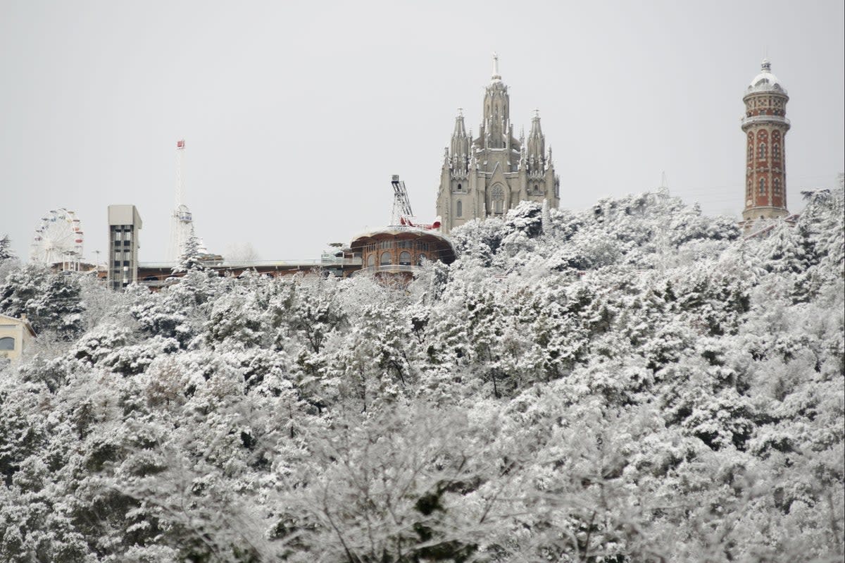 Snow covers the Tibidabo amusement park in Barcelona (AP)