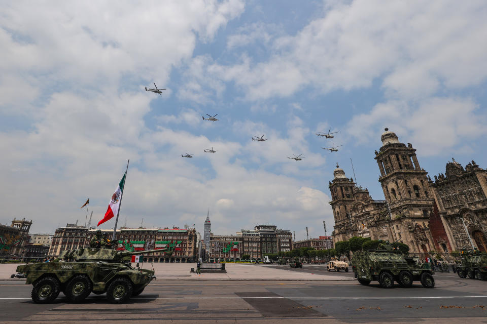 VARIOUS CITIES, MEXICO - SEPTEMBER 16: Mexican Air Force aircrafts perform a ceremonial flight during the Independence Day military parade at Zocalo Square on September 16, 2020 in Various Cities, Mexico. This year El Zocalo remains closed for general public due to coronavirus restrictions. Every September 16 Mexico celebrates the beginning of the revolution uprising of 1810. (Photo by Hector Vivas/Getty Images)