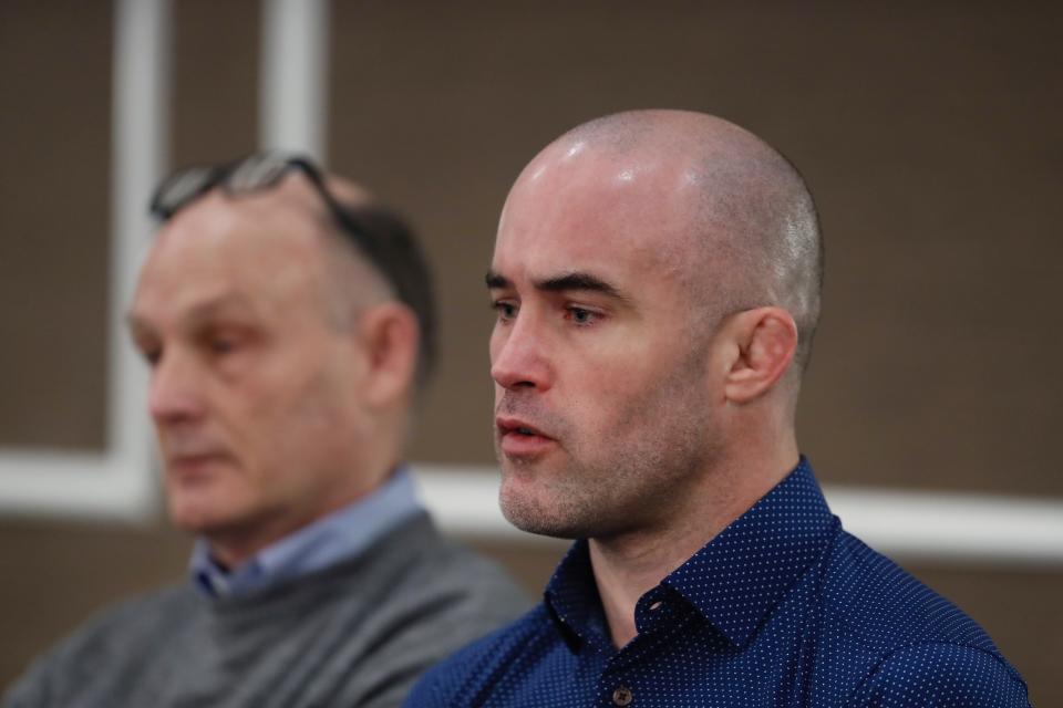 Andy Hrovat addresses the media during a news conference, Thursday, Feb. 27, 2020 in Southfield, Mich. Hrovat is one of the University of Michigan wrestlers who says he was abused by a sports doctor. (AP Photo/Carlos Osorio)