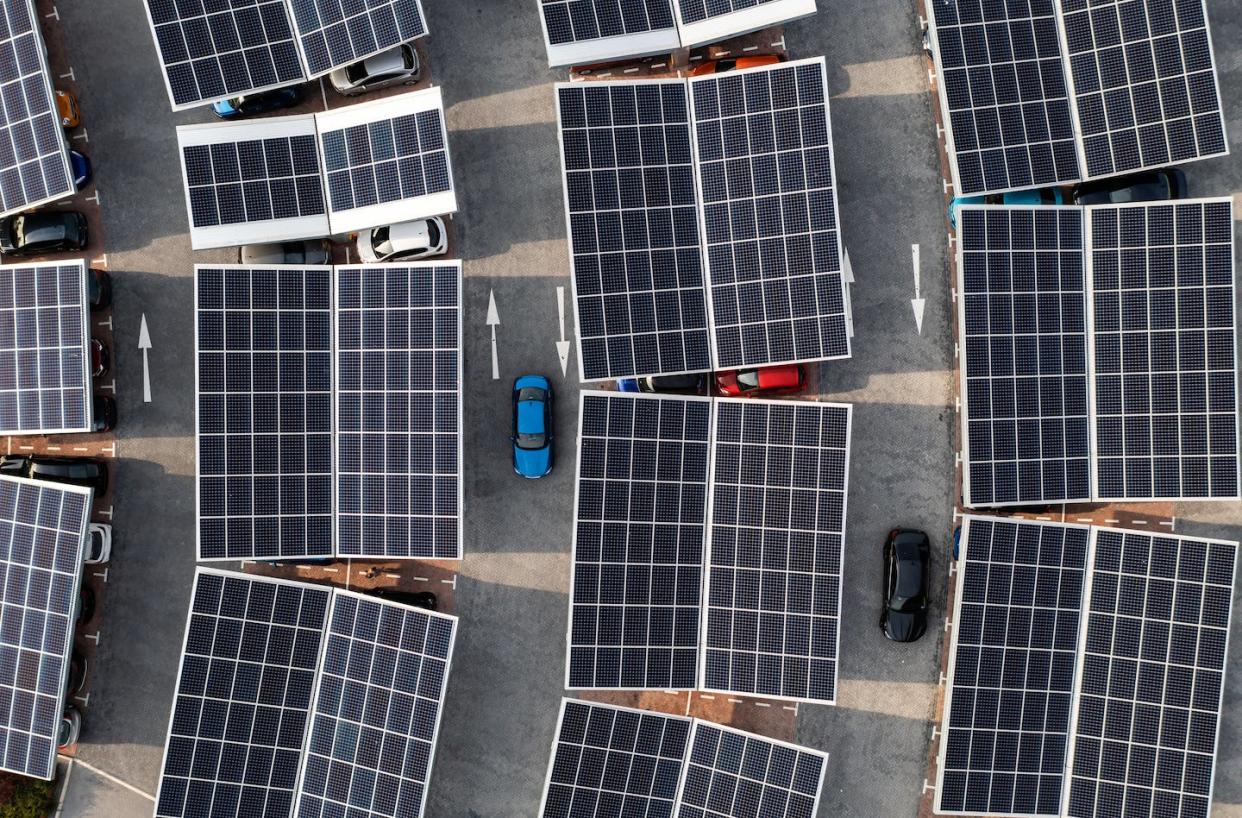 French lawmakers voted to require solar panel covers in most large parking lots. <a href="https://www.gettyimages.com/detail/photo/aerial-view-of-solar-panels-on-a-parking-lot-royalty-free-image/1409700815" rel="nofollow noopener" target="_blank" data-ylk="slk:Teamjackson via iStock/Getty Images Plus;elm:context_link;itc:0;sec:content-canvas" class="link ">Teamjackson via iStock/Getty Images Plus</a>