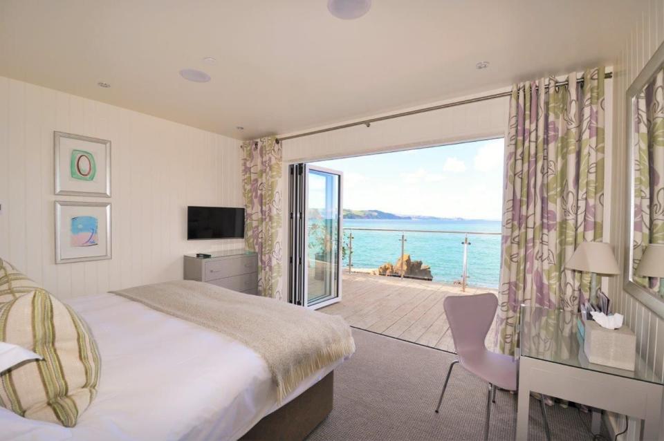 <p>If beachside bliss, bay-hopping boat rides, rock pooling and top-notch beach barbecues appeal, <a href="https://www.booking.com/hotel/gb/cary-arms-babbacombe-torquay.en-gb.html?aid=2070935&label=coastal-retreats" rel="nofollow noopener" target="_blank" data-ylk="slk:Cary Arms & Spa;elm:context_link;itc:0;sec:content-canvas" class="link ">Cary Arms & Spa</a> should be on your must-visit list. This luxury UK coastal retreat is simply bursting with charm. </p><p>There's a host of beach-chic accommodation to choose from, including beach huts and suites and h0liday cottages for larger groups. And the hotel's own classic sailing boat means you can explore the surrounding coves and bays in style. It's a little slice of heaven in Devon.</p><p><a class="link " href="https://www.booking.com/hotel/gb/cary-arms-babbacombe-torquay.en-gb.html?aid=2070935&label=coastal-retreats" rel="nofollow noopener" target="_blank" data-ylk="slk:CHECK AVAILABILITY;elm:context_link;itc:0;sec:content-canvas">CHECK AVAILABILITY</a></p><p>We want to help you stay inspired. <a href="https://hearst.emsecure.net/optiext/optiextension.dll?ID=7YU7qVoYVtfwDQ9FRmu13FlJO1voc2zWFpXEkCOg3fHM93yYTOZhzXhAkCYFJ0k4z8Lej9Pfnfdp7K" rel="nofollow noopener" target="_blank" data-ylk="slk:Sign up;elm:context_link;itc:0;sec:content-canvas" class="link ">Sign up</a> for the latest travel tales and to hear about our financially protected escapes and bucket list adventures.</p><p><a class="link " href="https://hearst.emsecure.net/optiext/optiextension.dll?ID=7YU7qVoYVtfwDQ9FRmu13FlJO1voc2zWFpXEkCOg3fHM93yYTOZhzXhAkCYFJ0k4z8Lej9Pfnfdp7K" rel="nofollow noopener" target="_blank" data-ylk="slk:SIGN UP;elm:context_link;itc:0;sec:content-canvas">SIGN UP</a></p>