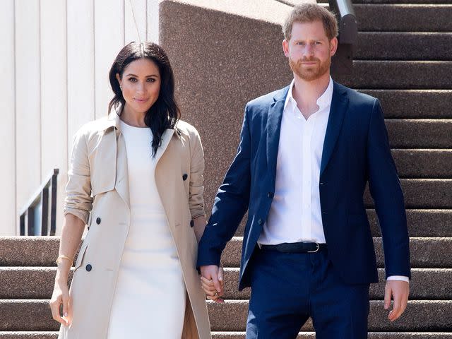 <p>Paul Edwards - Pool/Getty</p> Prince Harry, Duke of Sussex and Meghan, Duchess of Sussex meet and greet the public at the Sydney Opera House on October 16, 2018 in Sydney, Australia.