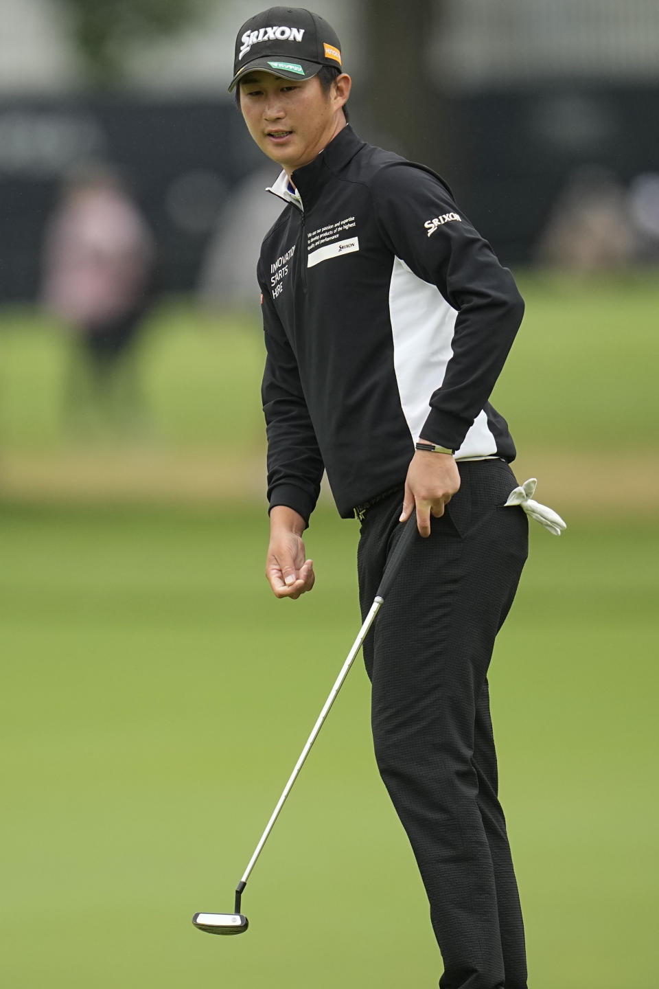 Rikuya Hoshino, of Japan, putts on the 17th hole during the third round of the PGA Championship golf tournament at Southern Hills Country Club, Saturday, May 21, 2022, in Tulsa, Okla. (AP Photo/Sue Ogrocki)