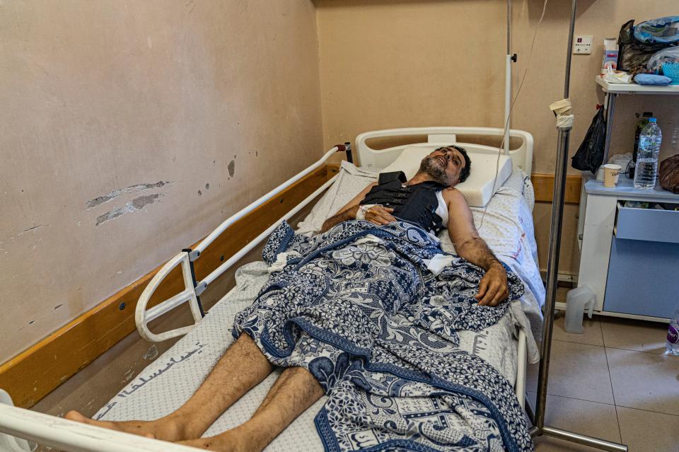 Shoukri Kollaq, who lost three children and his wife in the bombing, recovers in hospital (Bel Trew)