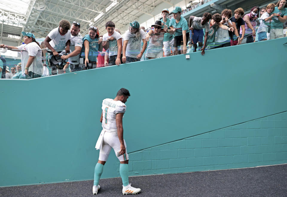 Miami Dolphins quarterback Tua Tagovailoa (1) walks out the fields after loss to the Atlanta Falcons in an NFL football game against the Atlanta Falcons, Sunday, Oct. 24, 2021, in Miami Gardens, Fla. (David Santiago/Miami Herald via AP)