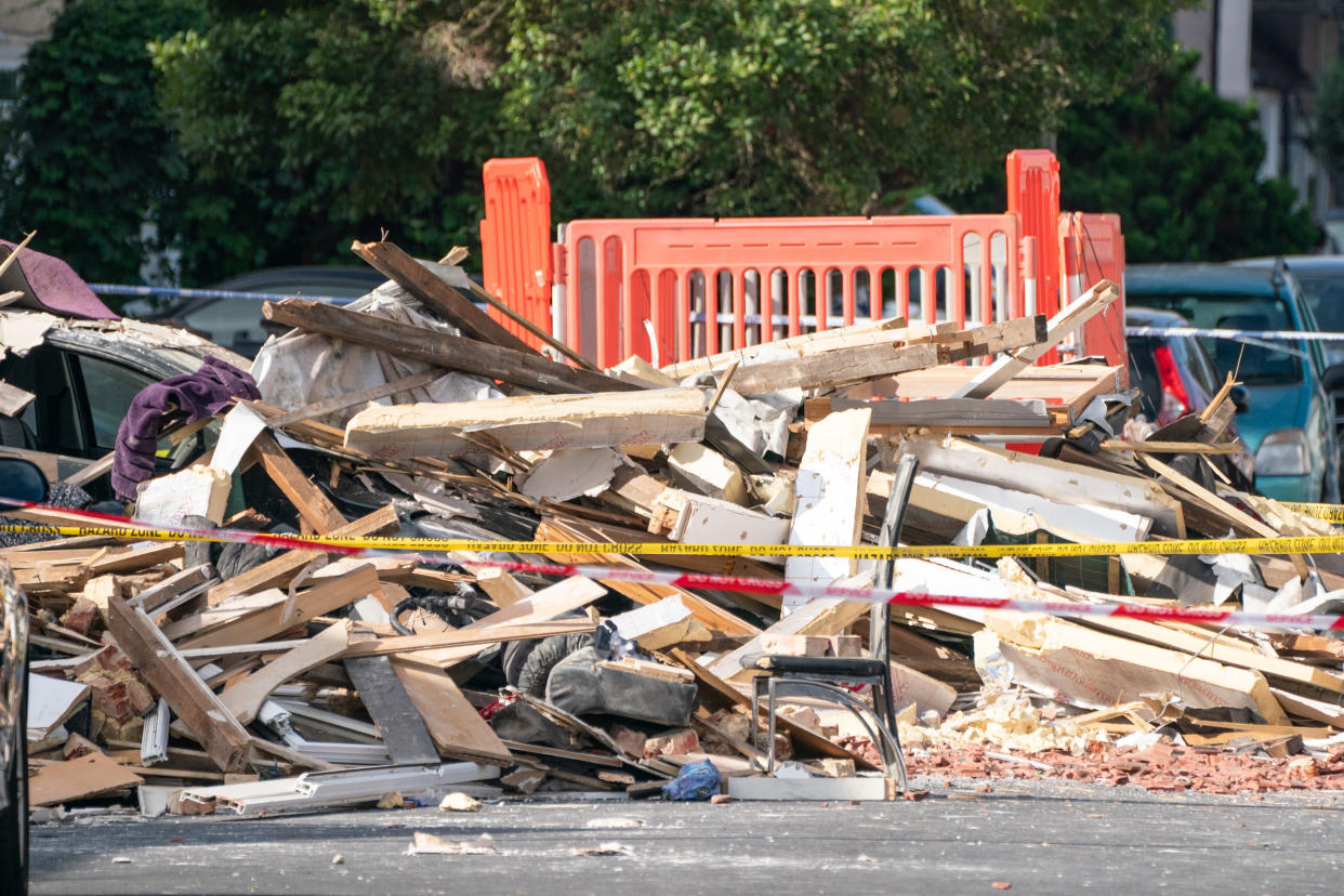 General view debris at the scene of an explosion on Galpin's Road in Thornton Heath, south London. The London Ambulance Service has confirmed a child has died and three people are in hospital after the terraced home collapsed following an explosion and fire on Monday. Picture date: Tuesday August 9, 2022.